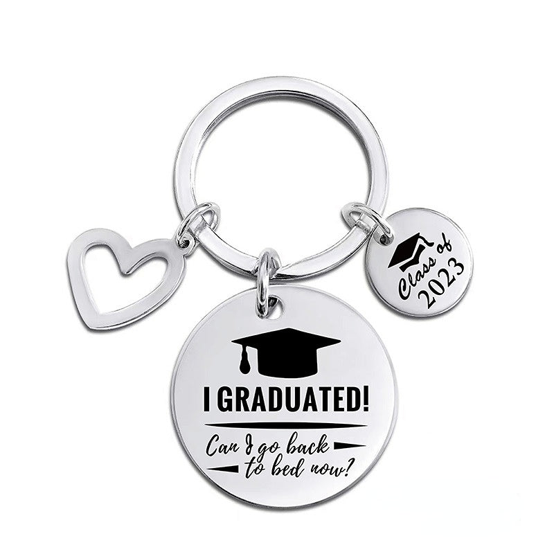 Venta al por mayor, regalo de temporada de graduación, letras, tarjeta redonda de acero inoxidable, llavero de corazón